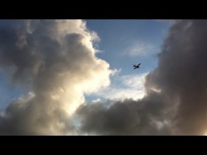 Cessna with Clouds